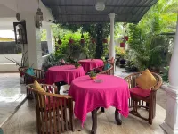 Rock Cascade Tourist Home &Cookery School فنادق في بولوناروا