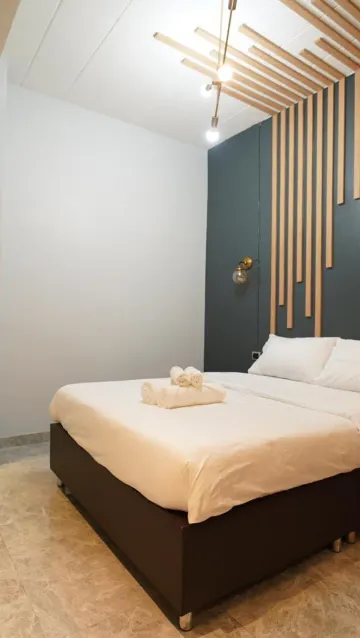 ห้องเตียงใหญ่หรือเตียงแฝดพร้อมห้องน้ำที่ใช้ร่วมกัน