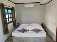 미스터체크 파라다이스 방갈로 Tha Bo 호텔