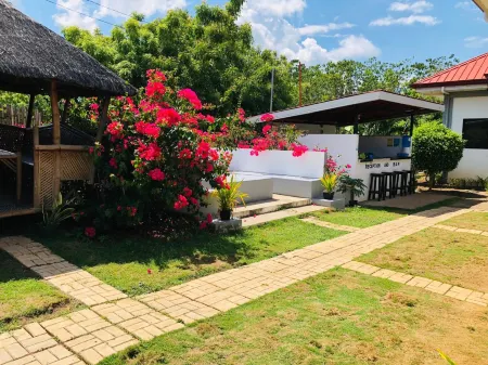 Paradise Beach Guest House Отели рядом с достопримечательностью «Райский пляж»