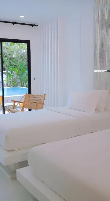 ห้องเตียงแฝดพร้อมทางสู่สระว่ายน้ำ