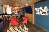 홀리데이 인 호텔 & 스위트 에르모시오 아에로푸에르토