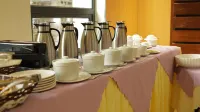 Tropical Plaza Apartments - petit déjeuner