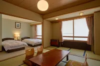 Nishihoppo Onsen Hotel - ที่มีบาร์