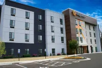 Spring Place Inn & Suites Hotel in zona Strayer University