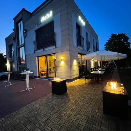 K&T Estates Resort & Spa, Frankfurt Отели рядом с достопримечательностью «Арена «Фрапорт»»