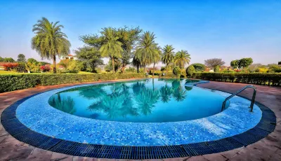 Clarks Safari Pushkar Hotels near Shiv Shakti Art & Handicraft