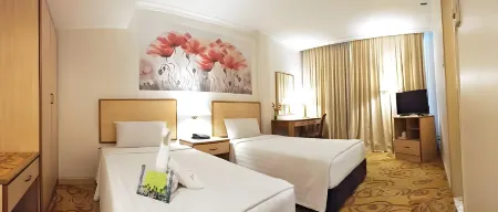 THE ORCHID HOTEL Отели рядом с достопримечательностью «Lin's Swan Garden»