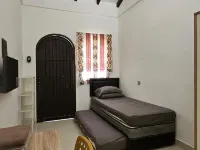 Cute Room at Pondok Raima SYARIAH Hotels in Gresik Regency