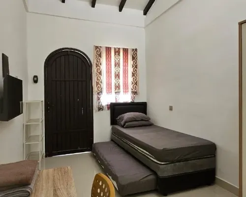 Cute Room at Pondok Raima SYARIAH Hotel di Kabupaten Gresik