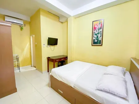 Damigalova Guest House Mitra RedDoorz Отели в г. Rawa Sari
