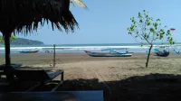 Mini Tiga Homestay - Strand