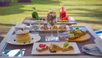Radisson Blu Udaipur Palace Resort & Spa - 朝食