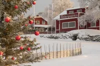 Tällbergsgårdens Hotell فنادق في ليكساند