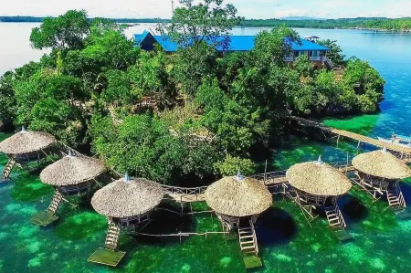 Enchanted River Rock Island Resort Отели в г. Hinatuan