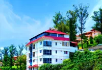 Lumino Dwellings Hotels in Ikka Nagar