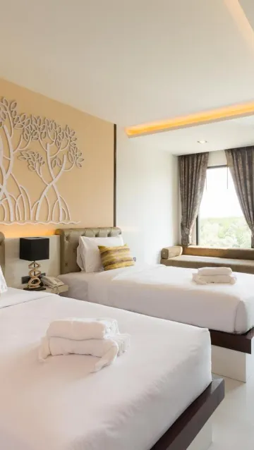 ห้องดีลักซ์ เตียงแฝด พร้อมวิวสระว่ายน้ำ