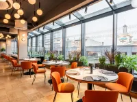 Aston Hotel Riga Отели рядом с достопримечательностью «Спортивно-концертный комплекс «Арена Рига»»