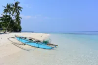 Lambug Beach Homestay - سرير ووجبة إفطار
