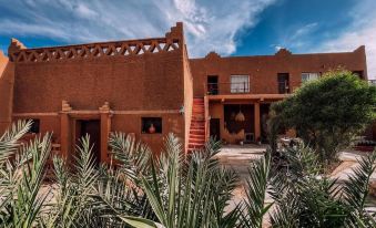 Dar Talmoudi ,Traditional Riad, Local Food, Camel , Desert Excursions