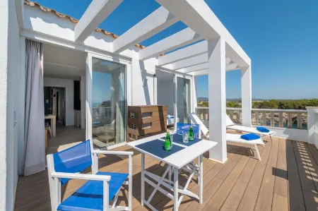 Orange Colom - Seaside Apartments Отели рядом с достопримечательностью «Castillo de Santueri»