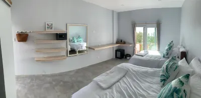 크라운 말라파스쿠아 로곤 비치 주변 호텔