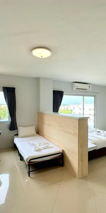 ห้องพักสำหรับสามท่านพร้อมระเบียง