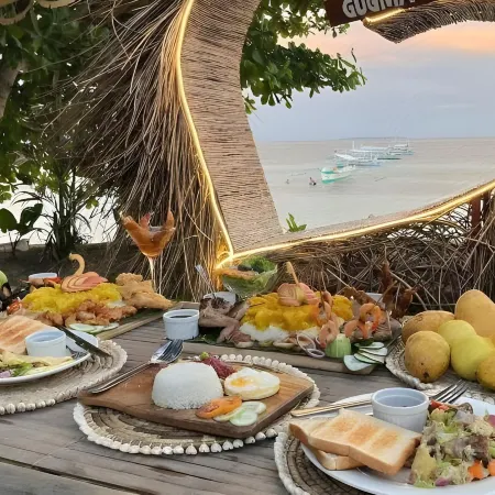On Board Panglao Beach Hostel & Resort Отели рядом с достопримечательностью «Пляж Думалуан»