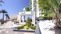 Alezzi Beach Resort Hotels near Doors Beach