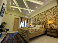 the realtors inn luxurious 1bed apartment dha 2 - جاكوزي