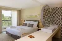 Ozadi Tavira Hotel