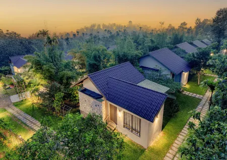 Coffee Greens Resort Отели в г. Канииамбетта