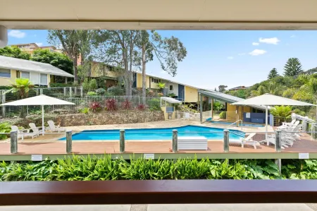 Tathra Beach House Holiday Apartments Отели в г. Танджа
