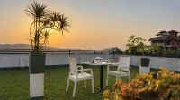 Red Chillies Nature Inn - Losmen