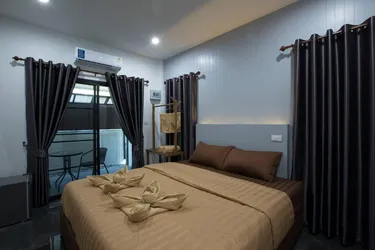 รูปภาพของข้างบ้าน รีสอร์ท