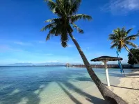 Costa Azalea Crusoe Cabins - Beach