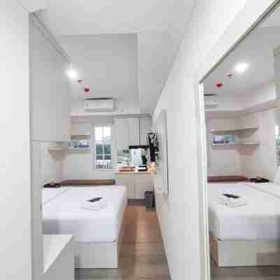 Warm and Cozy Style Studio Room at Paltrow City Apartment By Travelio Rooms