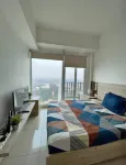 Cozy Apartemen Treepark BSD By LyaRoom with City View