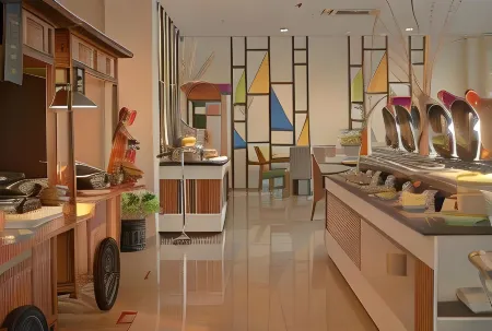 Patra Dumai Hotel Отели в г. Думай