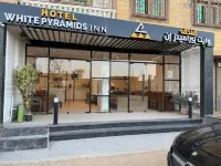 White Pyramids Inn - Inns