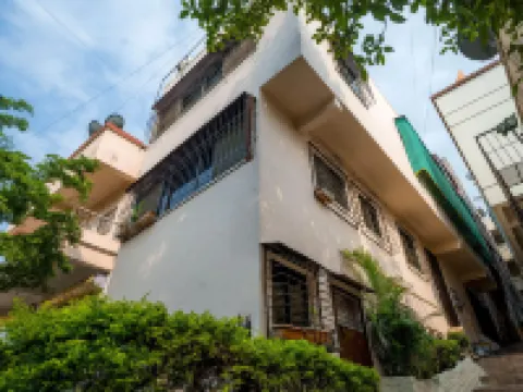 Paradise Homestay - Lodging and Boarding โรงแรมใกล้Sarasbaug Ganpati Temple