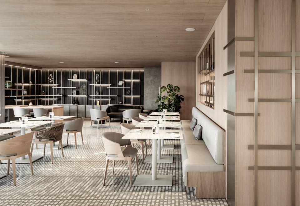 AC 호텔의 모던한 로비와 라운지 공간