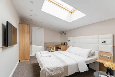 KamInn (КамИнн) Отели рядом с достопримечательностью «выстрелка о времени»