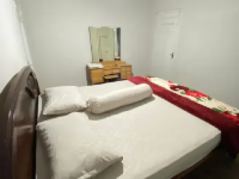 Mande Homestay Hoteles en Agam