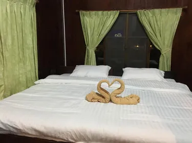 รูปภาพของบ้านไม้เคียงภู วังน้ำเขียว