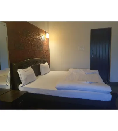 Bluebay Luxury Cottages - Malpe Отели в г. Малп