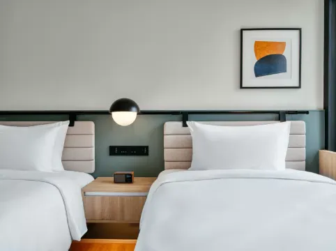 ดีลักซ์เตียงแฝด พร้อมระเบียงและวิวลาน