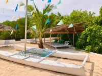 Whispering Palms Island Resort - Beach