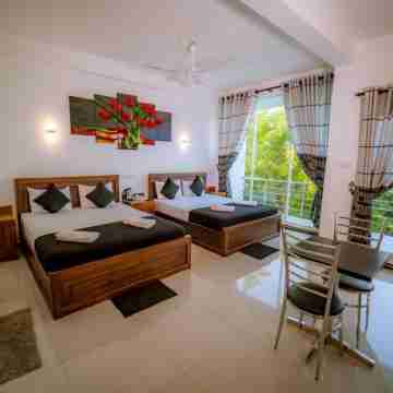 Liyonaa Beach Hotel Rooms