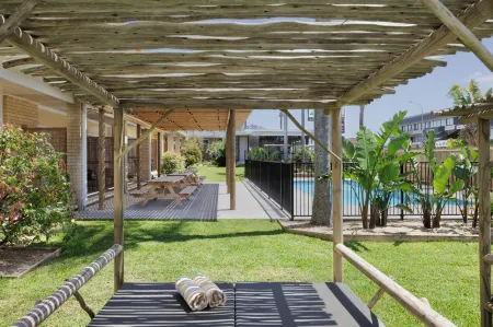 South Pacific Palms Motor Inn Отели в г. Танкарри